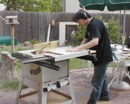 David cuts wooden go board